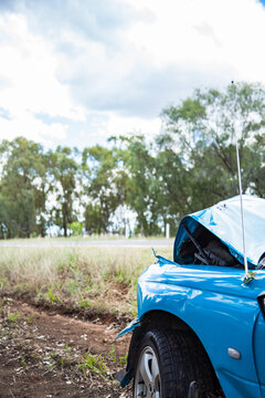 Car smashed up after running off the road and hitting a tree