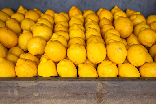 Box of Lemons stacked outside fruit shop