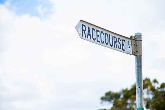 Racecourse lane road sign with copy space