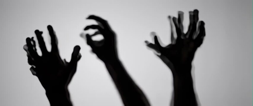 Anamorphic video Silhouette of a zombie hand