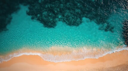 Aerial view of a sandy beach with turquoise water