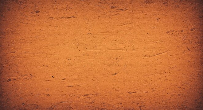 A brown wall with a rough texture