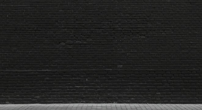 Fototapeta Black Brick Wall with Gray Pavement Background