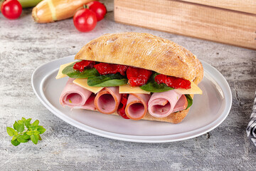 Ciabatta with mortadella, tomato, cheese and spinach
