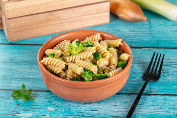 Italian vegan pasta fusilli with broccoli