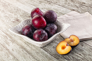 Ripe sweet juicy plum heap