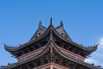 Naklejka premium The upward perspective of Chinese pavilions and towers