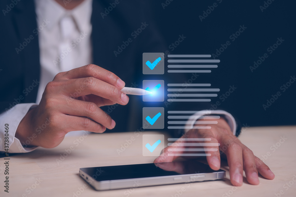 Poster businessman using smartphone and pen tick correct mark in concept of quality control check list feed