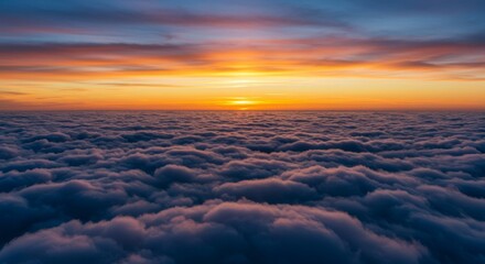 Fototapeta premium Aerial view of a vast cloud sea at sunrise