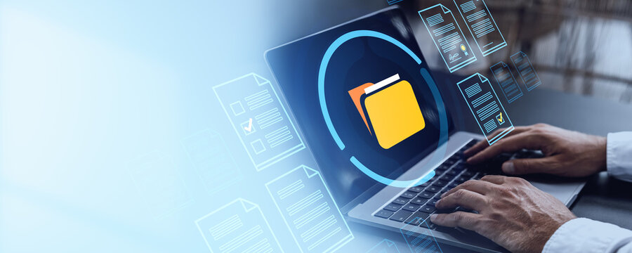 Digital file management concept with man using laptop and folder icon on screen.