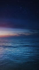 Peaceful ocean at night under stars and glowing twilight gradient