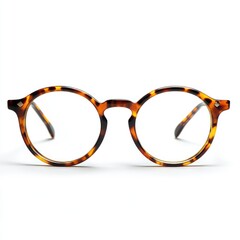 Tortoiseshell and gold-framed glasses on a white background