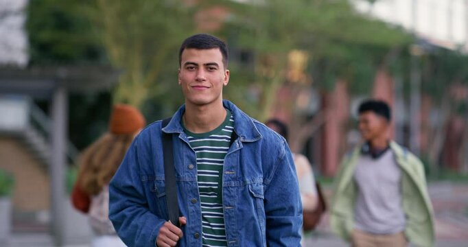 Man, student and happy on campus for education, knowledge and pride for scholarship. Academic, portrait or smile in university for private funding, learning or walk to lecture at college in Australia