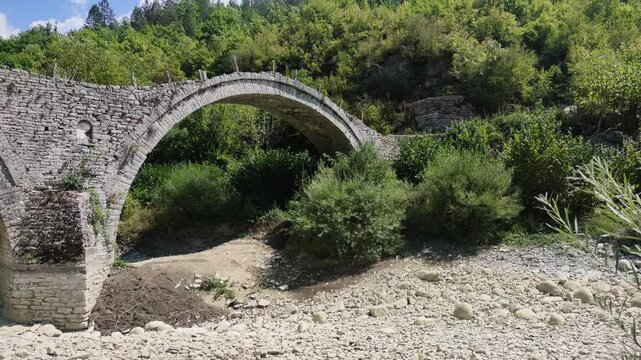 Amazing  view of Medieval Plakidas (Kalogeriko) Bridge at Pindus Mountains, Zagori, Epirus, Greece
