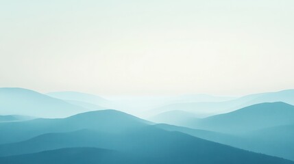 Obraz premium Misty mountain range, soft blue hues
