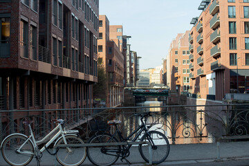 Bicycles on Bridge over Canal in Historic Hamburg Warehouse District