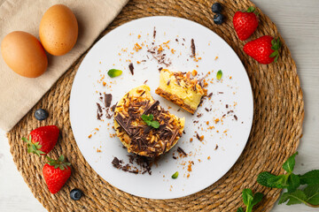 Mango almond and chocolate tartlet. Top view table.