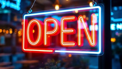 Vibrant neon 'OPEN' sign illuminated at night in a bustling urban area with blurred background lights