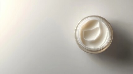Creamy facial moisturizer in a jar