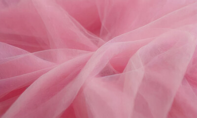 Obraz premium Close-up of pink tulle fabric texture