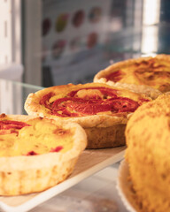 Sweet cupcakes isolated. Cakes in cafe showcase. Fresh pastry in cake stand. Sweet dessert in cake stand. Delicious bakery. Pastry ready-to-eat. Gourmet dessert in restaurant.