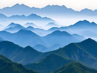 Obraz premium Serene Blue Mountains Landscape Misty Peaks and Rolling Hills in a Breathtaking View