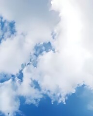 Obraz premium Fluffy White Clouds in a Blue Sky