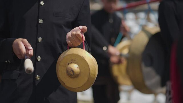 Probolinggo, East Java, Indonesia - August 3, 2023: The Tenggerese people of Bromo use the Slompret Naga, gongs, and drums during the Unan-Unan ceremony.