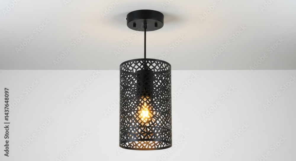 Aufkleber a black pendant light with a patterned shade hangs from a white ceiling in a minimalist setting
