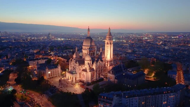 4k Aerial Views of Basilica of the Sacred Heart at night in Paris. France
