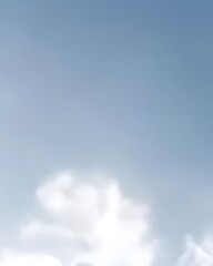 Obraz premium Soft Clouds in a Pale Blue Sky