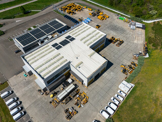 Solar powered construction machinery distribution and service center. Aerial view