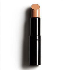 Nude lipstick in black cylindrical tube against white background photographed from above
