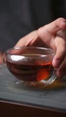 A Warm Brewed Tea in a Beautiful Transparent Cup for Enjoying its Rich Aroma and Flavor. Media