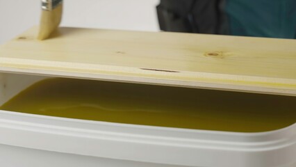 A creative video shows woodworking artistry with vibrant painting. Creative