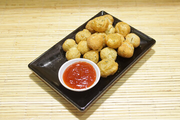 Delicious fried meatball snack. a plate of fried meatballs