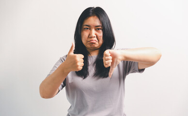 Asian girl expresses dislike, person express negative feeling, concept business complaint from...