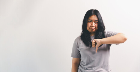 Asian girl expresses dislike, person express negative feeling, concept business complaint from...