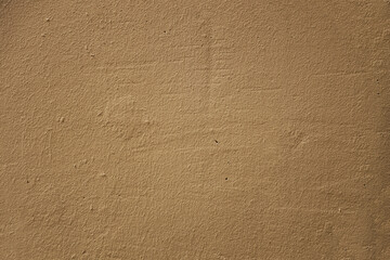 rose pastel tone red stucco wall pattern. Abstract construction design background. fence fragment. light pink plaster Wall Texture. Backdrop. Abstract Painted Wall Surface. Copy Space Peach fuzz