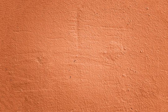 red pink violet tone stucco wall pattern. Abstract construction design background. fence fragment. light pink plaster Wall Texture. Backdrop. Abstract Painted Wall Surface. Copy Space Peach fuzz
