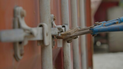 A Detailed Close Up View of the Locking Mechanism Found on Cargo Shipping Containers. Stock Footage