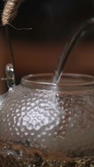 An Elegant Teapot with Water Pouring is a stunning representation of artistry in design. Media