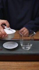 Elegant glassware enhances artisan tea preparation, delighting the senses fully. Media