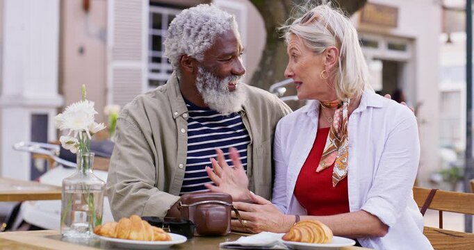 Old couple, interracial and holding hands with love, talking and travel in Paris, smile and marriage. Outdoor, restaurant and senior man with mature woman, bonding together and care with relationship