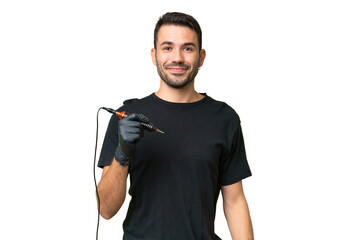 Tattoo artist caucasian man over isolated background with surprise facial expression