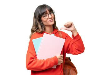 Young student caucasian woman over isolated background proud and self-satisfied