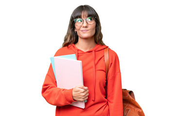Young student caucasian woman over isolated background and looking up