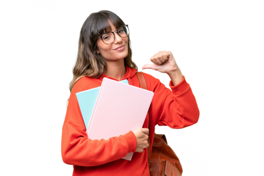 Young student caucasian woman over isolated background proud and self-satisfied