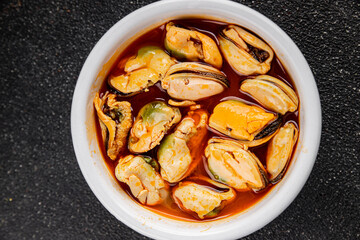 Mussels canned seafood appetizer dish organic product fresh tasty gourmet food background on the table rustic food top view copy space keto paleo pescetarian diet vegetarian food