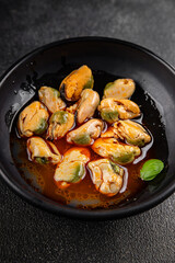 Mussels canned seafood appetizer dish organic product fresh tasty gourmet food background on the table rustic food top view copy space keto paleo pescetarian diet vegetarian food